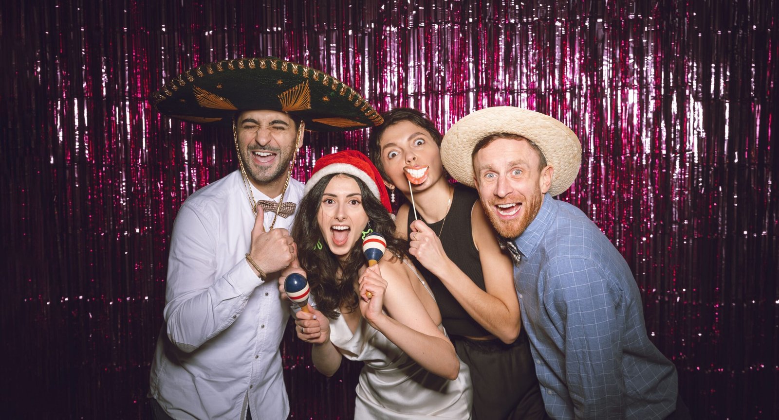 Friends posing together in a photo booth